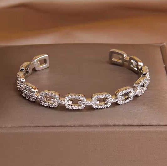 Elegant Silver Stainless Steel Bracelet with Embedded Crystals